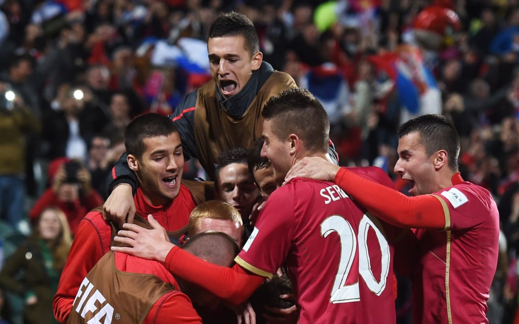 Serbian players celebrate their historic semi-final victory over Mali