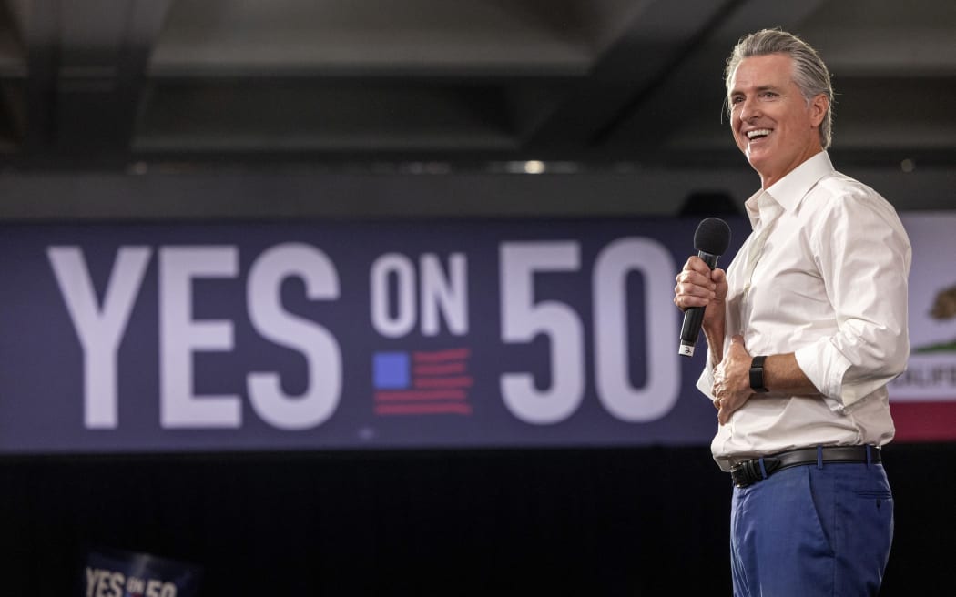LOS ANGELES, CALIFORNIA - NOVEMBER 1: California Governor Gavin Newsom speaks at a "Yes On Prop 50" volunteer event at the LA Convention Center on November 1, 2025 in Los Angeles, California. California's Prop 50 is on the ballot to either authorize or deny temporary changes to congressional district maps. Election Day is November 4th.   Jill Connelly/Getty Images/AFP (Photo by Jill Connelly / GETTY IMAGES NORTH AMERICA / Getty Images via AFP)