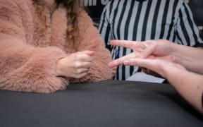 A heated game of rock, paper, scissors
