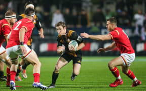 Chiefs halfback Brad Weber lines up the Welsh defense during the rugby union match - Chiefs v Wales played at FMG Stadium Waikato, Hamilton, New Zealand on Tuesday 14 June 2016.