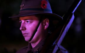250414. Photo Diego Opatowski / RNZ. ANZAC Day celebrations in Wellington. Soldier on the Cenotaph.