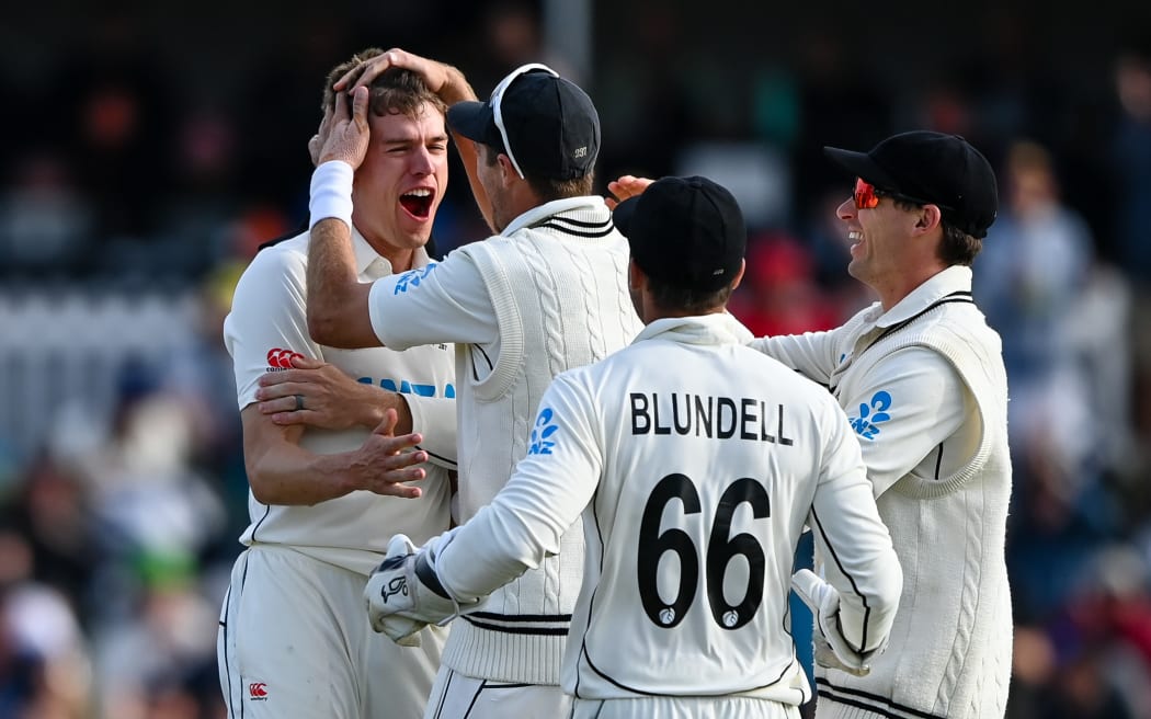 Ben Sears of the Black Caps celebrates a wicket and is congratulated by Tim Southee and team-mates. 2024.