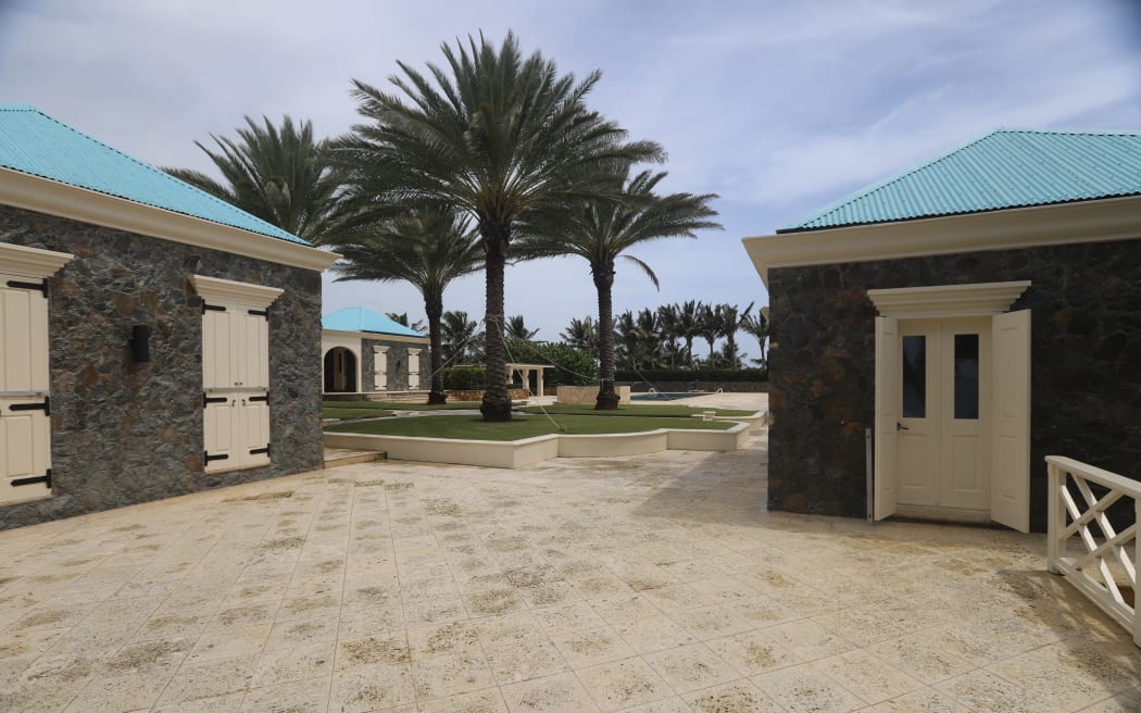 This undated handout photo from the US Virgin Islands Attorney General's office released on December 3, 2025, by US Representative Robert Garcia, Ranking Member of the Committee on Oversight and Government Reform, shows an exterior view of Jeffrey Epstein's home on his private island, Little St. James Island, US Virgin Islands. (Photo by HANDOUT / US Virgin Islands Attorney General's Office / AFP) / RESTRICTED TO EDITORIAL USE - MANDATORY CREDIT "AFP PHOTO /  US VIRGIN ISLANDS ATTORNEY GENERAL'S OFFICE / HANDOUT" - HANDOUT - NO MARKETING NO ADVERTISING CAMPAIGNS - DISTRIBUTED AS A SERVICE TO CLIENTS