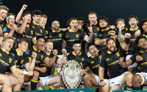 Wellington players celebrate after winning the Ranfurly Shield match by defeating Hawke's Bay, 2022.