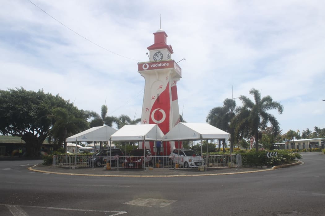 Clock tower in Apia, Samoa painted with logo of a telecommunications company