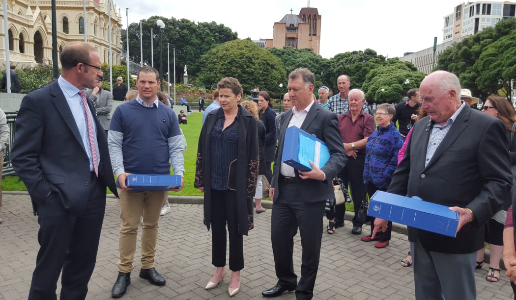 Tauranga-based patient with advanced melanoma, Leisa Renwick, outside Parliament today to present a petition to Health Minister Jonathan Coleman.