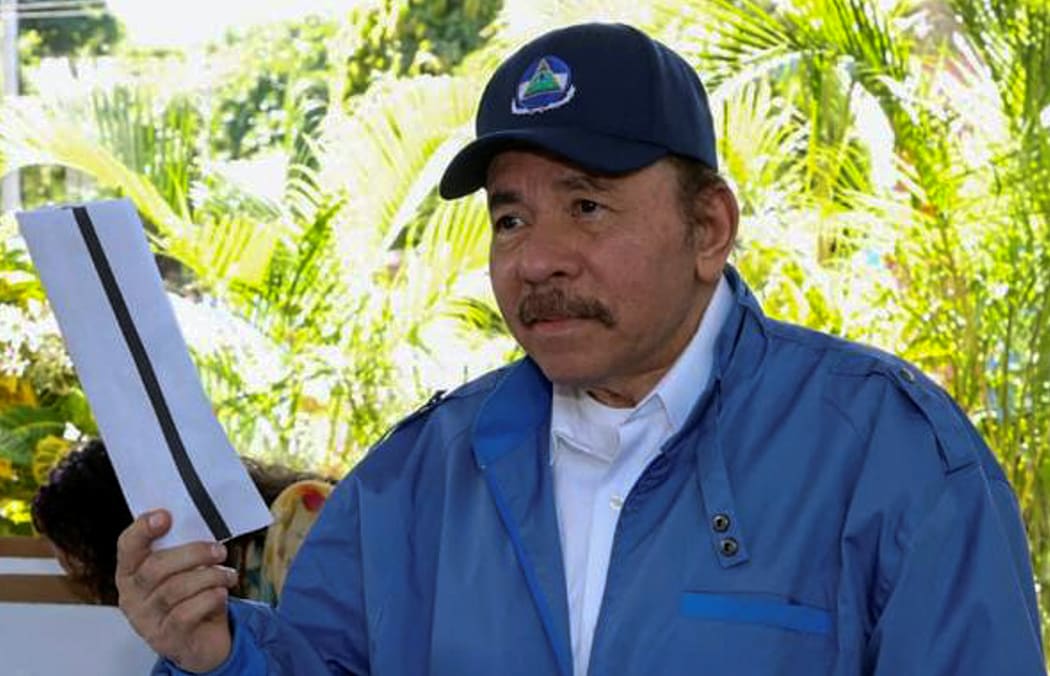 Handout picture released by Nicaragua's presidency press office of Nicaragua's President and presidential candidate Daniel Ortega ready to cast his vote during the general election, in Managua, Nicaragua on November 07, 2021.