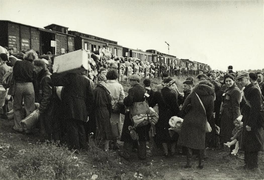 In Westerbork, in the Netherlands, Jews board a deportation train to Auschwitz