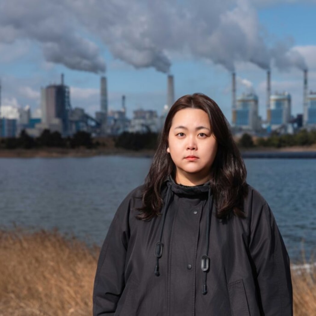 Borim Kim in front of the Taean Coal Power Plant, South Korea. January, 2026.
