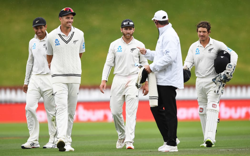Black Caps leave the field as the rain arrives at the Basin Reserve.