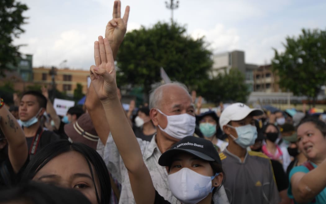 Protests displaying three fingers mark to anti-dictatorship during a protest, Thousands of anti-government gathered protesters rally call for new constitution and new elections at Democracy Monument on August 16, 2020 in Bangkok, Thailand.