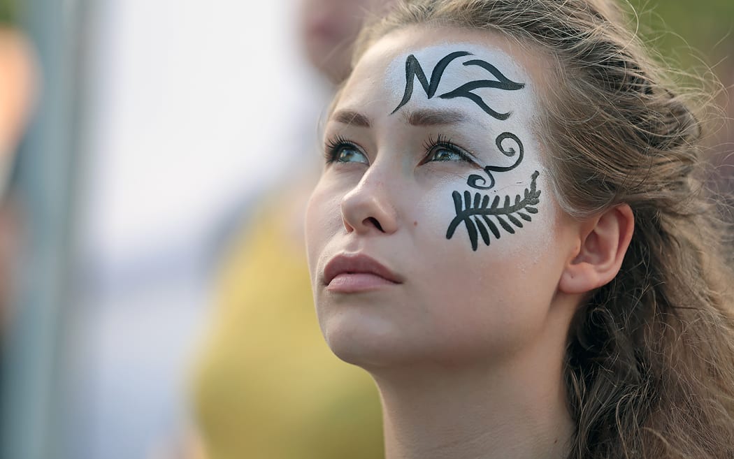 Fans stood for the national anthem at the Auckland fan zone.