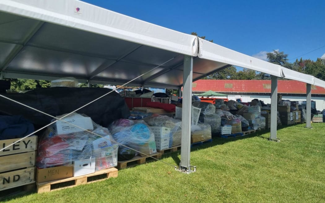 The Hastings' Tomoana Showgrounds has been transformed into a regional distribution hub for volunteers, Civil Defence staff, and military personnel to sort through donated clothing, food, and other supplies.