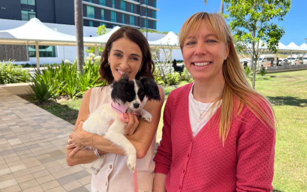 Julija Kinghorn (right) travelled on the inaugural flight with Poppy the six-month-old Papillon.