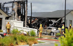 A house has caught fire in Milldale, Auckland