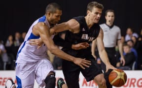New Zealand`s Kirk Penney is challenged by Korea`s Tae Jong Moon in the third international test match, New Zealand v South Korea, North Shore Events Centre, Auckland, New Zealand, Saturday, July 19, 2014.