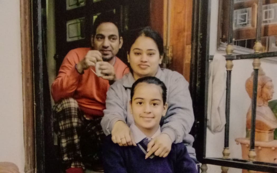 Vanita Sehgal (centre), her husband Rajeev Seghal and their daughter Mehak.