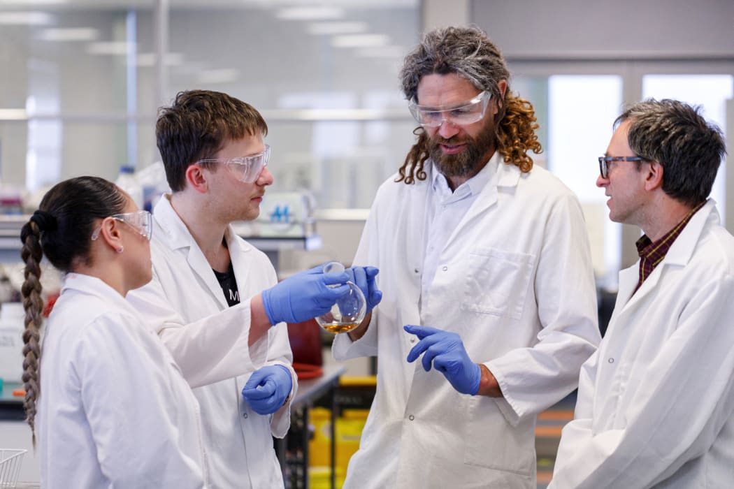 Rua Bioscience co-founder Panapa Ehau with cannabinoid researchers at a New Zealand university.