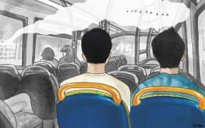 Two young men on a bus.