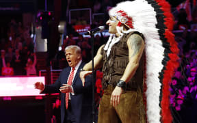 President-Elect Donald Trump dances on stage while the Village People perform "YMCA", 2025.