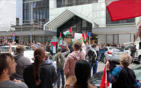 About 80 Palestinian supporters protesting outside the Israeli Embassy in Wellington on 9 November 2023.