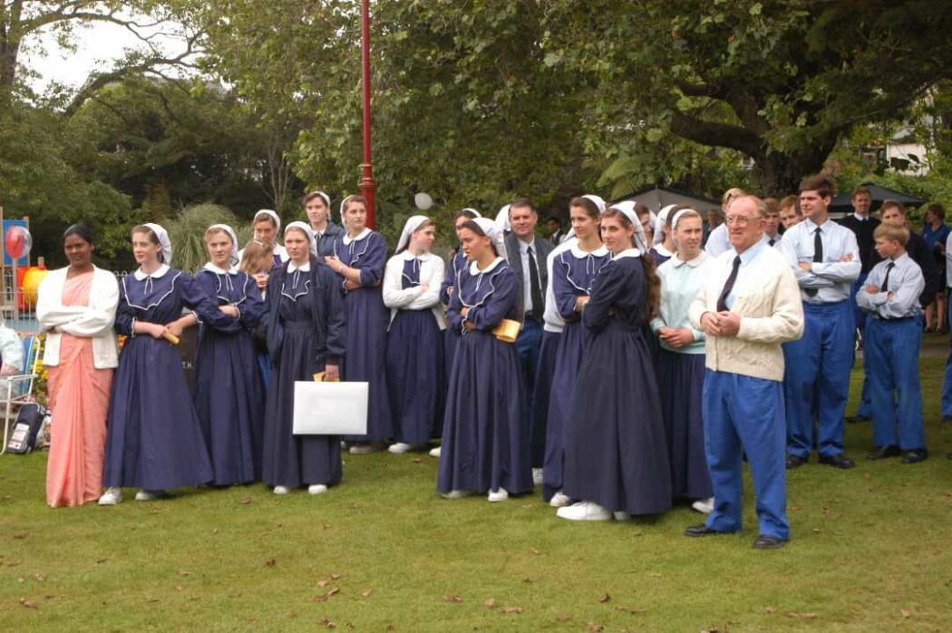 Hopeful Christian (pictured far right) with other members of the Gloriavale Community at an event of the West Coast.