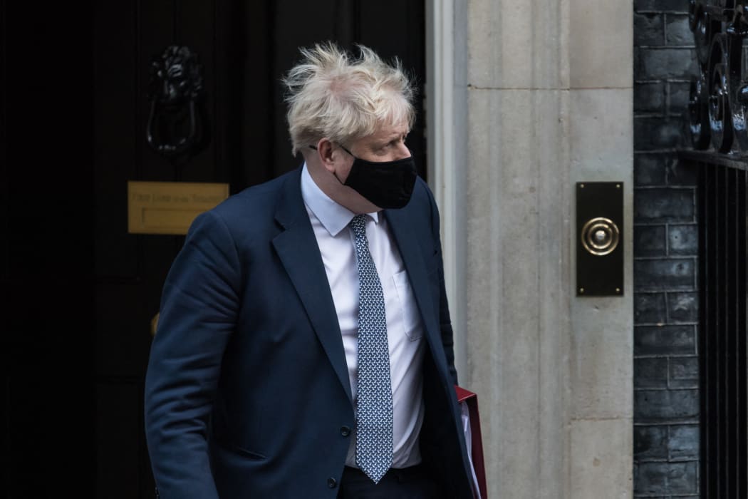 British Prime Minister Boris Johnson leaves 10 Downing Street on 12 January 2022.