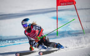 Alice Robinson of New Zealand speeds down the course during a World Cup giant slalom race in Italy, 2025.