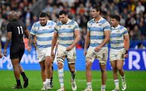 Dejected Argentina players during their Rugby World Cup final loss to the All Blacks.
