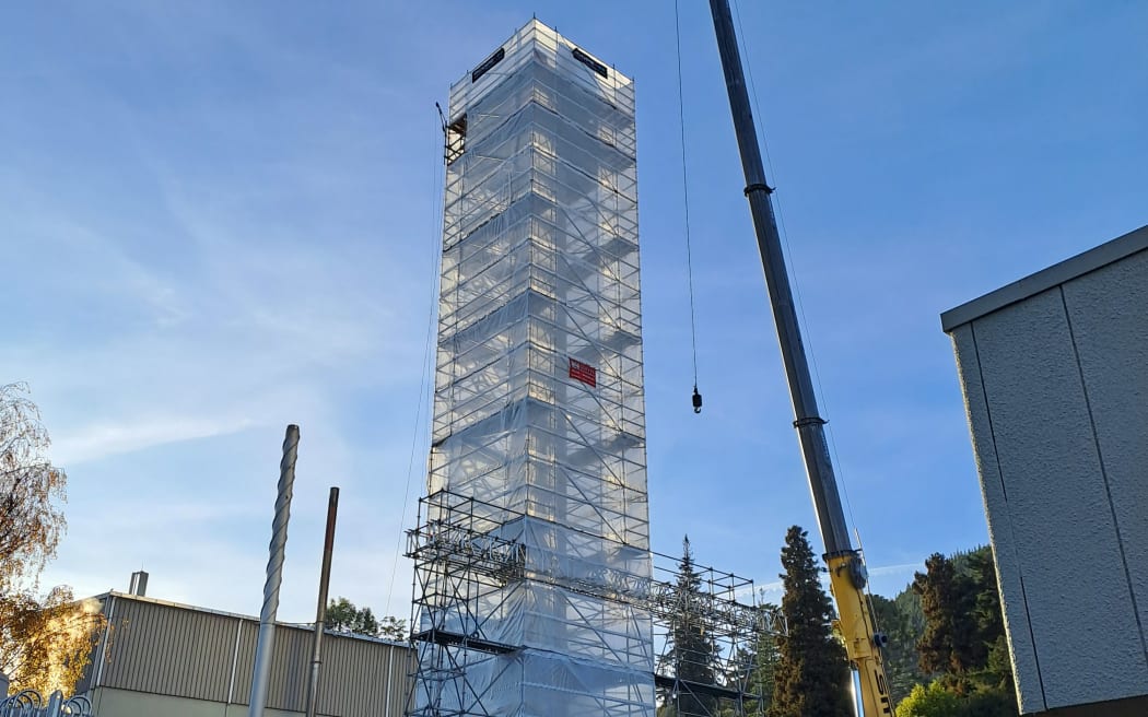 The Nelson Hospital chimney tower is being deconstructed, after the hospital switched to using landfill gas to meet its hot water and heating demands.