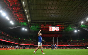 France's fly-half Matthieu Jalibert does a lap of honour after the Six Nations rugby match against Wales, Cardiff, 2026.