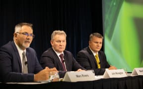 Fonterra's chief financial officer Marc Rivers (L), Chairman John Monaghan and interim chief executive Miles Hurrell.