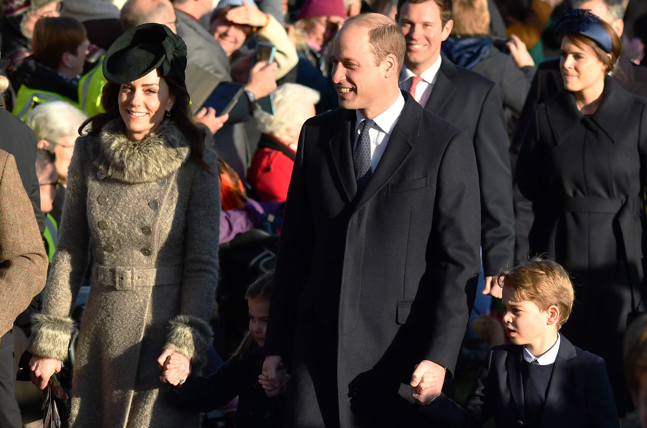Duchess of Cambridge Catherine, Princess Charlotte, Prince William and Prince George arrive for the royal family's traditional Christmas Day service on December 25, 2019.