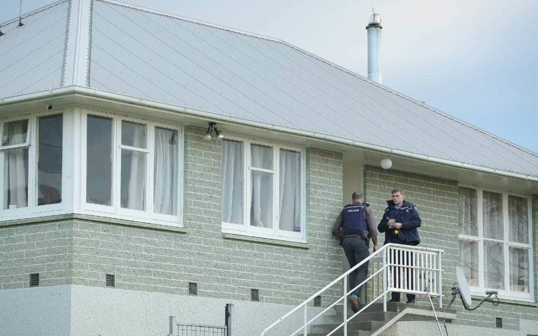 olice can be seen at a house on the corner of Pukaki Street and Morgans Road in Timaru where a sudden death occurred on Saturday.