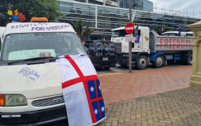 A truck and vans from the convoy covered protest messages.