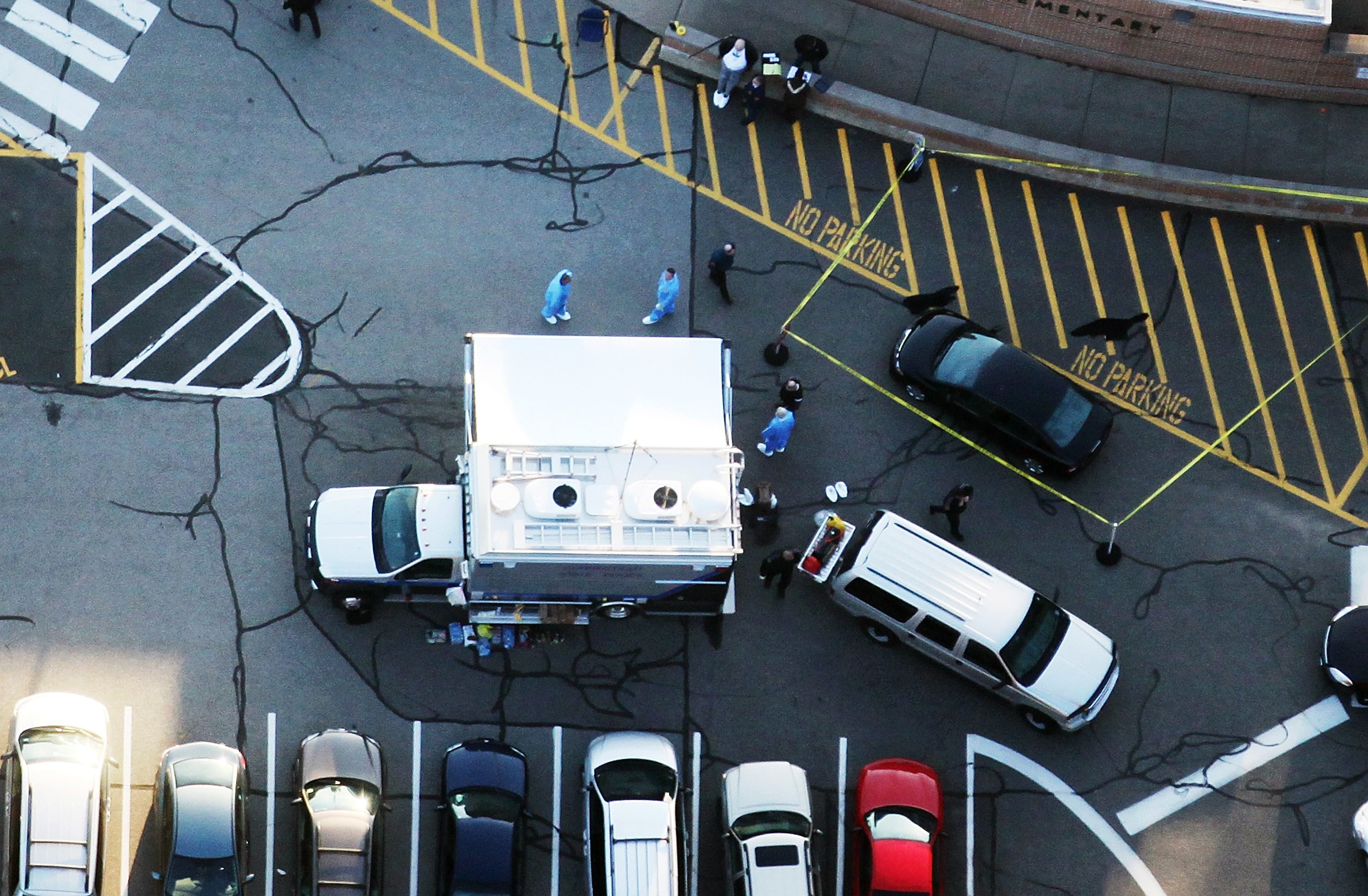 Responders gather at the scene of the mass school shooting at Sandy Hook Elementary School.