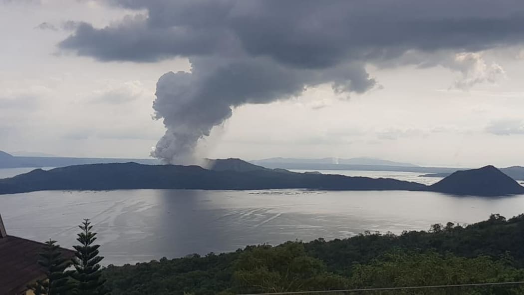 Taal volcano with ash plume