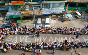 Protesters taking part in a demonstration against the military coup in Yangon's Hlaing township.