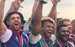 The Wan Papua Warriors celebrate winning the London Nines.