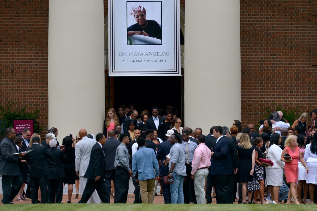 Mourners leave Wait Chapel at the conclusion of the Maya Angelou Memorial Service.