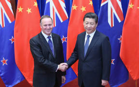 John Key with Chinese President Xi Jinping in Beijing during a visit in March.