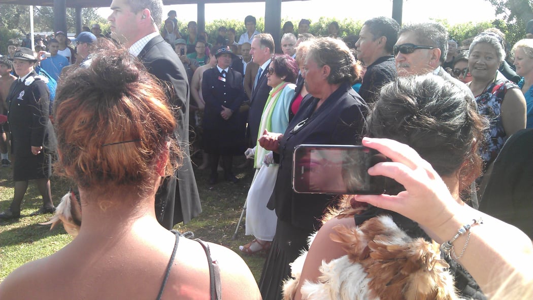 Prime Minister John Key, centre, was escorted onto the marae by elders including Titewhai Harawira.