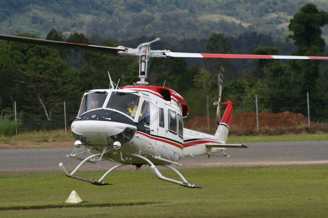 Helicopter taking off from Tari airport ni Papua New Guinea's Hela province.