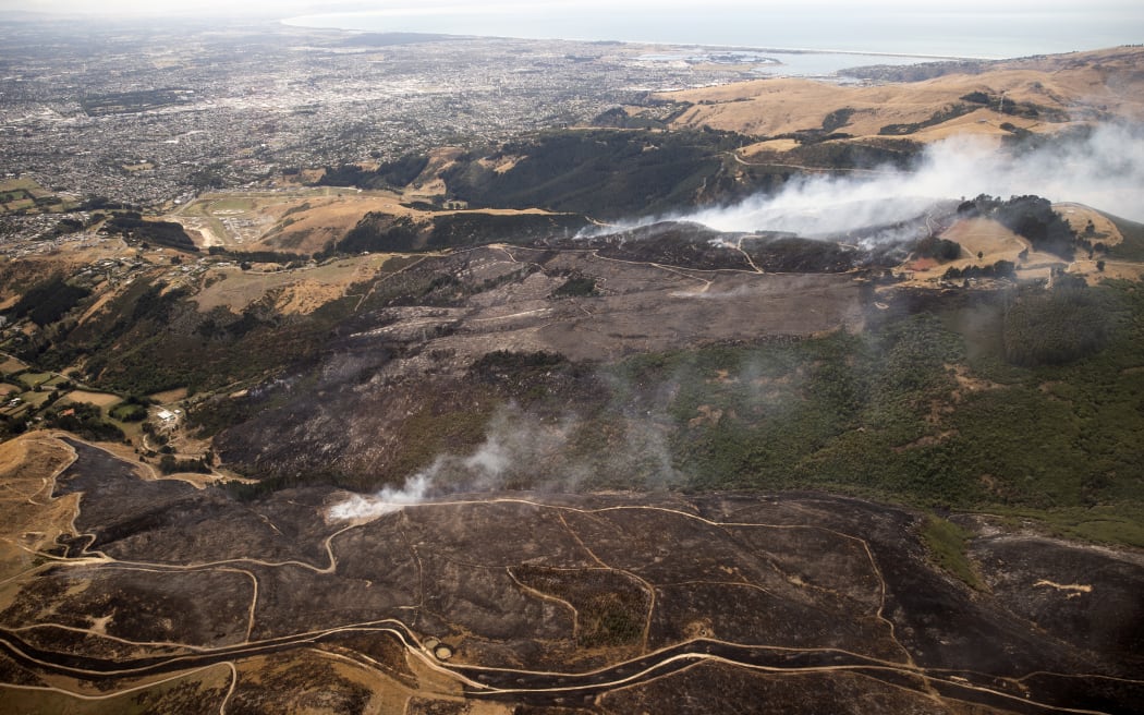 Firefighters a battling a 630 hectare fire in the Port Hills near Christchurch after it broke out on 14 February 2024. The fire remains uncontained and evacuations have taken place for nearby residents.