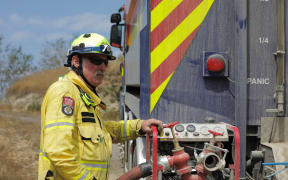 An unnamed (at this stage) firefighter at the Nelson fire.