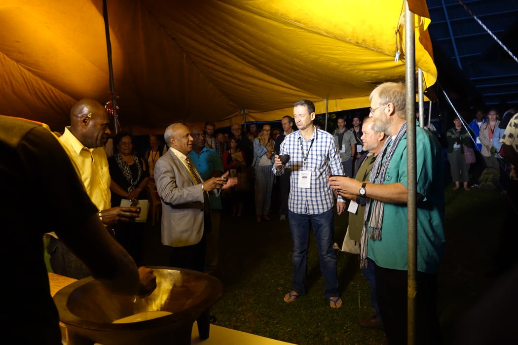 The Prime Minister of Vanuatu, Sato Kilman, left, with Stuart Bedford and Matthew Spriggs, right, at a kava ceremony to mark the opening of the Lapita conference and an exhibition at the Vanuatu Cultural Centre and national museum, in Port Vila.