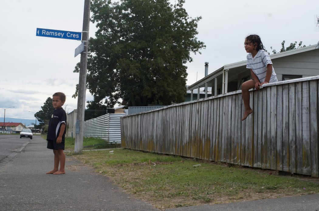 Students Marley and Jowaled on their street after school.
