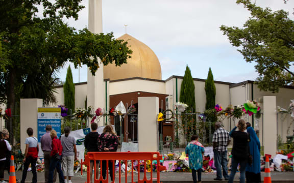 People gather outside Al Noor Mosque