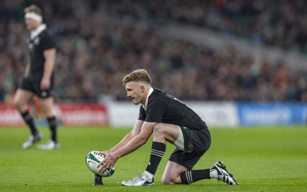 All Black Damian McKenzie lines up a penalty kick during All Blacks v Ireland.