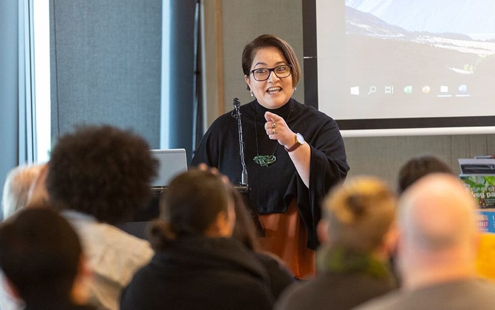 Ngāi Tahu kaiwhakahaere (director) Lisa Tumahai opens the Climate Change Symposium.